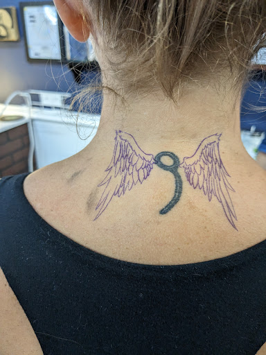 Explore neck tattoo ideas for women, creative tattoo ideas in Palm Harbor, available at High Quality Tattoo Studios
