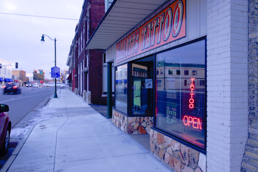 Explore pooh tattoo ideas, creative tattoo ideas in Little Falls, available at Elliotts Tattoo