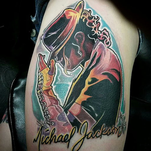 Explore men's neck tattoo ideas, creative tattoo ideas in Fort Wayne, available at Grade A Tattoos and Body Piercing