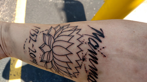 Explore half sleeve tattoo ideas forearm, creative tattoo ideas in South Bend, available at Mystic Union Tattoo & Piercing