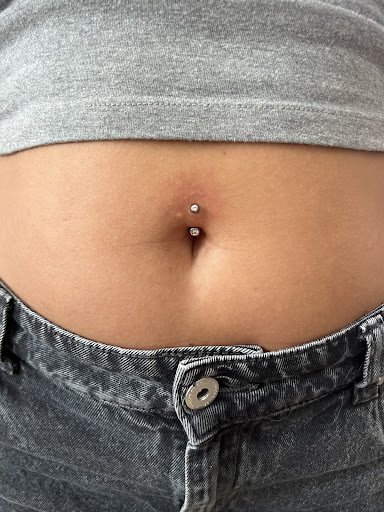 Explore women back tattoo ideas, creative tattoo ideas in Tooele, available at Elevn11 Piercings