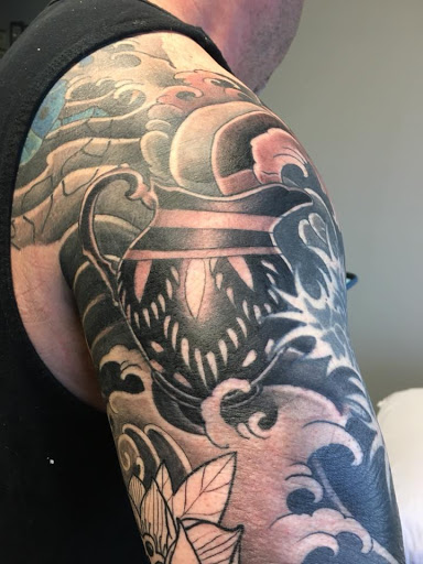 Explore small thigh tattoo ideas, creative tattoo ideas in Delmar, available at Resolute Tattoo