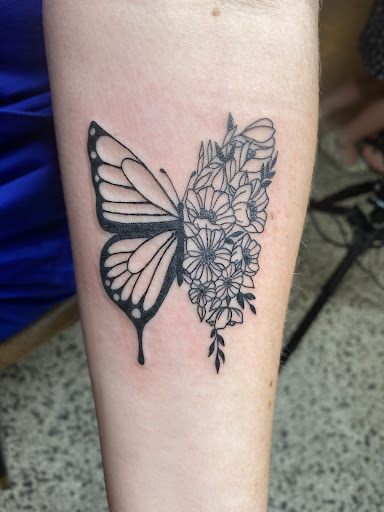 Explore concert tattoo ideas, creative tattoo ideas in Broxton, available at Seratonin Tattoo Parlor