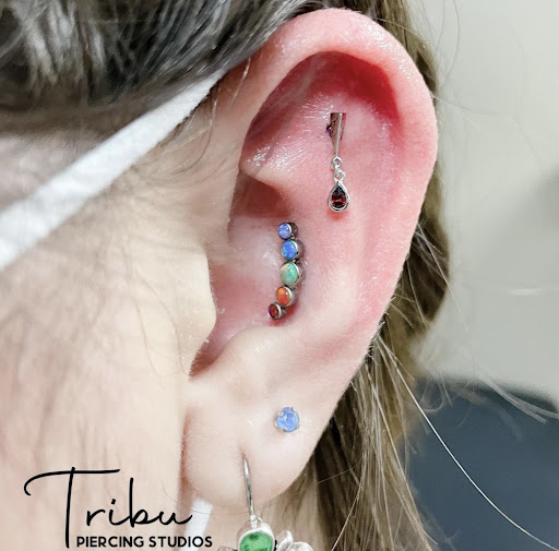 Explore tattoo cross ideas, creative tattoo ideas in Stamford, available at Tribu