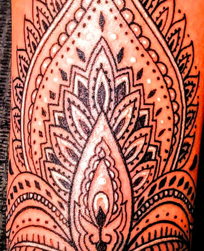 Explore thigh flower tattoo ideas, creative tattoo ideas in Fort Myers, available at Karney Life Enterprises