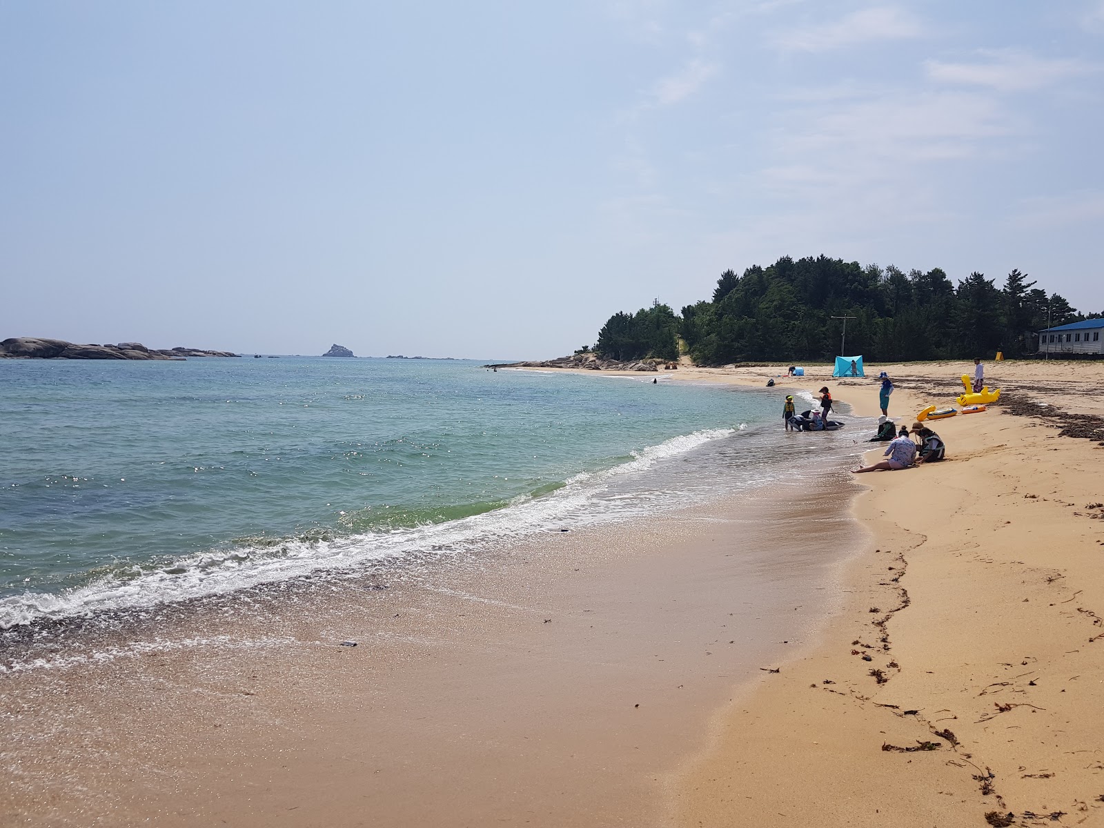 Foto von Bongsudae Beach mit beiger sand Oberfläche