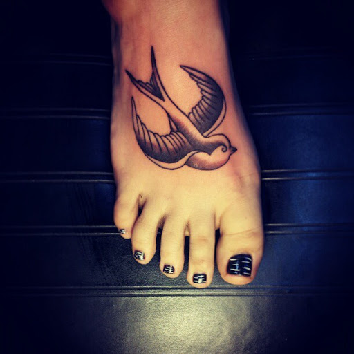 Find skull tattoo ideas for females for your next unique tattoo in Hood River at Hood River Tattoo