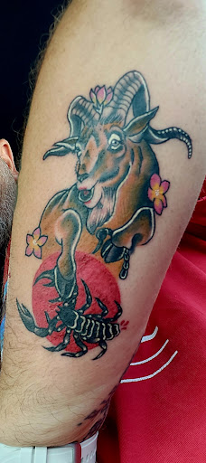 Explore tombstone movie tattoo ideas, creative tattoo ideas in Avon Park, available at Lions Den Ink Studio at The Collective