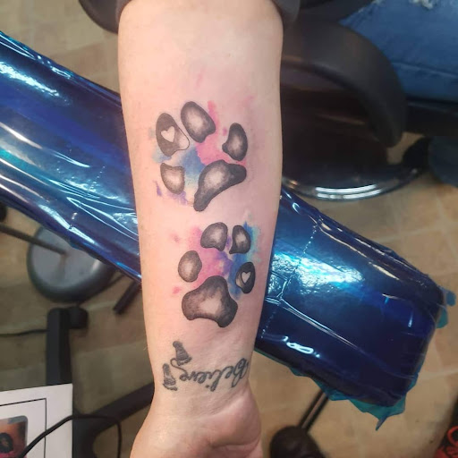 Explore stomach tattoo ideas for men, creative tattoo ideas in Decatur, available at Exclusive Ink Tattoos & Body Piercings 22nd & Wood