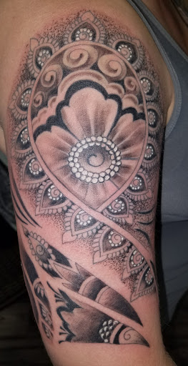 Explore small tattoo ideas for men with meaning, creative tattoo ideas in Canfield, available at Black Rose Tattoo Studio