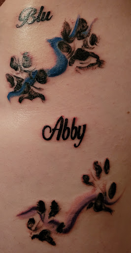 Explore name cover up tattoo ideas for men, creative tattoo ideas in Jefferson City, available at The Rad Rooster Tattoo Co.