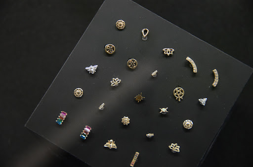 Find tattoo anklet ideas for your next unique tattoo in Puyallup at Evergreen Body Mod