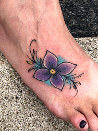 Explore tattoo ideas tribal arm, creative tattoo ideas in Jefferson City, available at The Ink Sling Studio