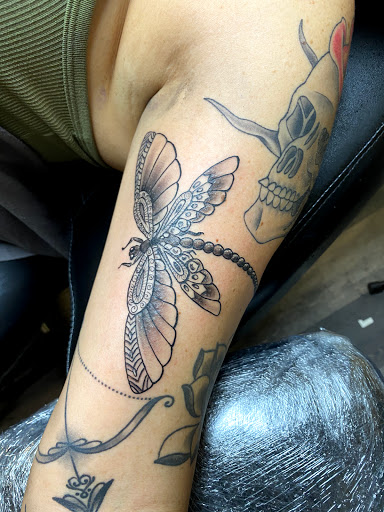 Explore tiny ankle tattoo ideas, creative tattoo ideas in Warner Robins, available at Untold Pain Tattoo Studio