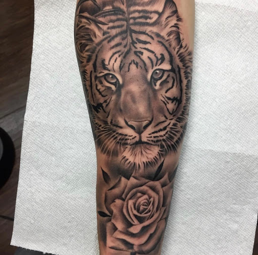 Find tattoo necklace ideas for your next unique tattoo in Junction City at Junction City Tattoo