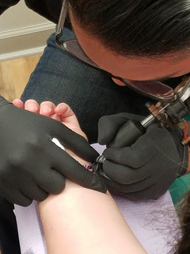 Explore brat tattoo ideas, creative tattoo ideas in Cleveland, available at Addicted Body Arts Studio