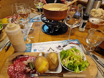 Raclette du Restaurant français Le Chalet Gourmand à Cluses - n°6