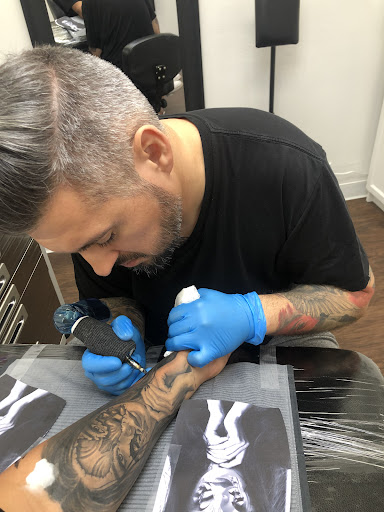 Explore trumpet tattoo ideas, creative tattoo ideas in Chicago, available at Chicago Realism Tattoos