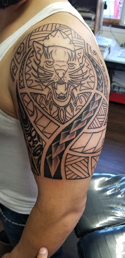 Explore koi fish sleeve tattoo ideas, creative tattoo ideas in Wenatchee, available at Rebels Tattoo Studio