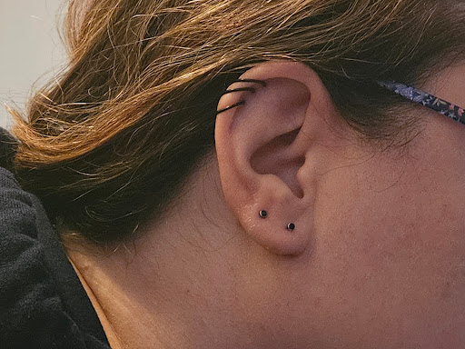 Explore strawberry tattoo ideas, creative tattoo ideas in Minocqua, available at Lotus Piercing