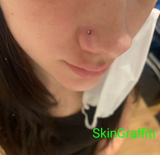 Find in between breast tattoo ideas for your next unique tattoo in Athens at SkinGraffiti Tattoo & Piercing