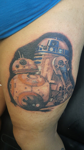 Explore paintbrush tattoo ideas, creative tattoo ideas in Atoka, available at Lucky Devil Tattoo