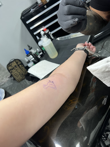 Explore feminine cross tattoo ideas, creative tattoo ideas in Phoenix, available at Grand Avenue Tattoo & Piercings