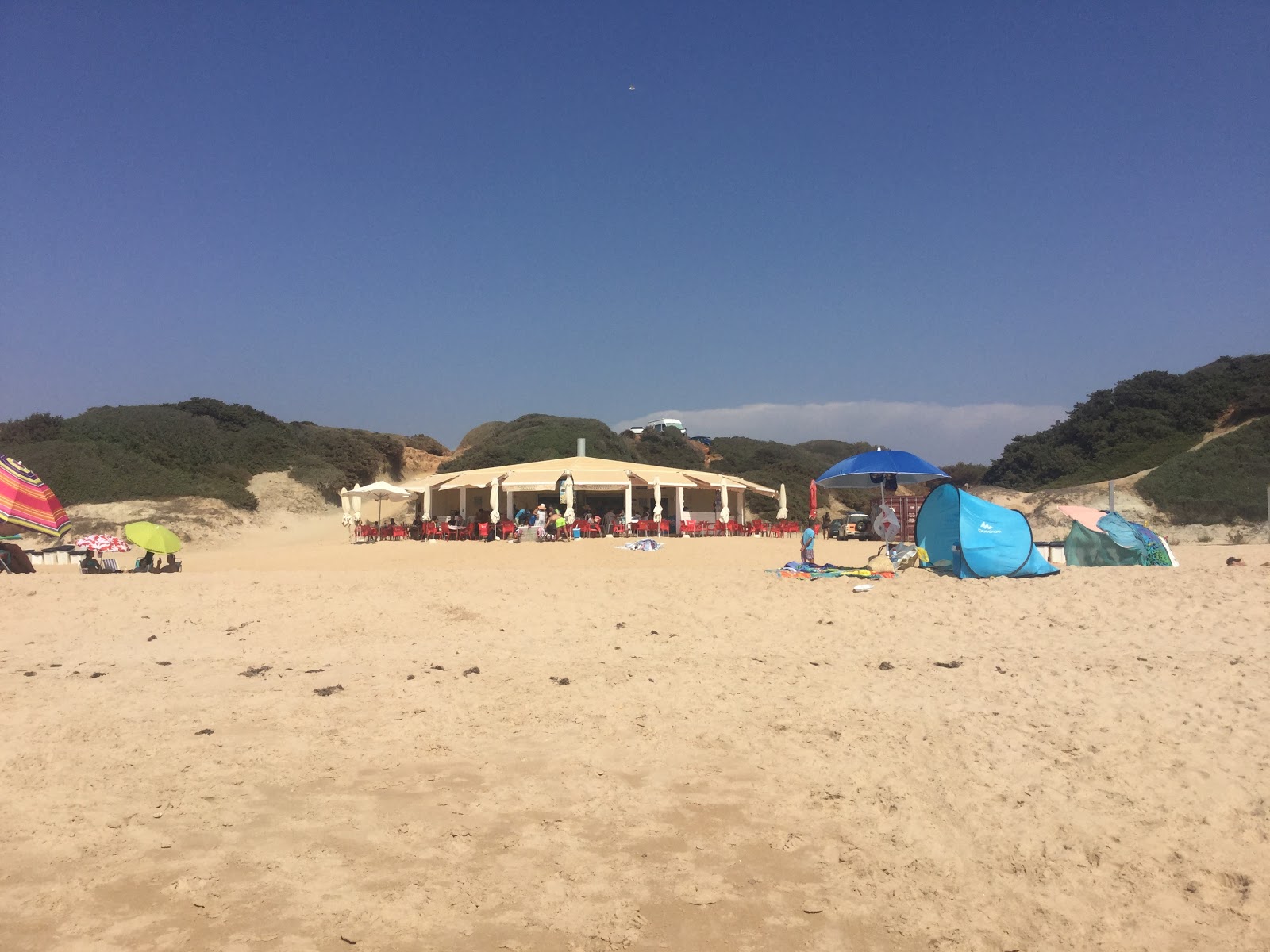 Fotografija Puerco Plaža z dolga ravna obala