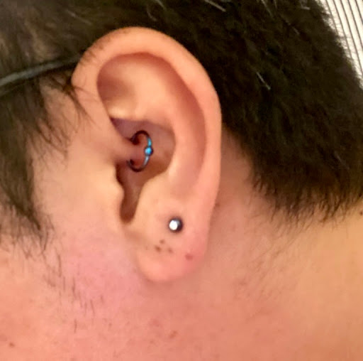 Explore shoulder sleeve tattoo ideas, creative tattoo ideas in Minneapolis, available at Almost Famous Body Piercing