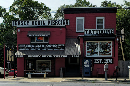 Explore dominican tattoo ideas, creative tattoo ideas in Blackwood, available at Jersey Devil Tattooing & Body Piercing
