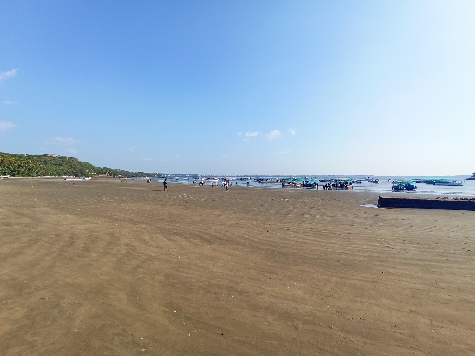 Foto von Coco Beach mit beiger sand Oberfläche