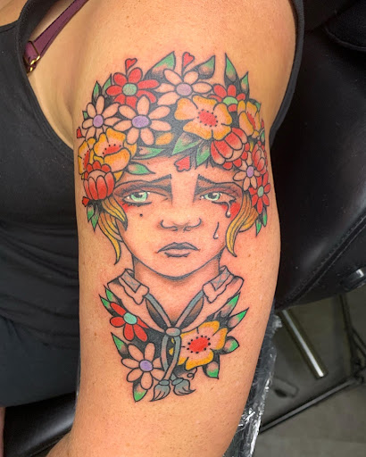 Explore portrait tattoo ideas, creative tattoo ideas in Navarre, available at Eleven 11 Tattoo Studio