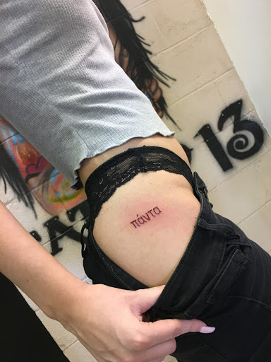 Explore cervical cancer tattoo ideas, creative tattoo ideas in Farmington, available at TATTOO 13 & Laser Tattoo Removal