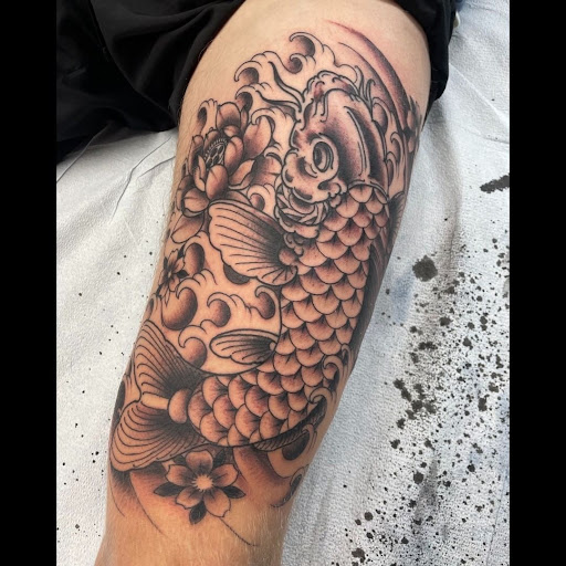 Explore feminine cross tattoo ideas, creative tattoo ideas in Roseville, available at Emerald Tattoo & Piercing - Roseville