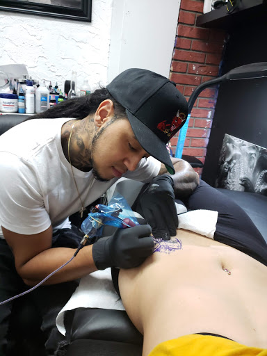 Tattoo Shop «Tuff City Tattoos», reviews and photos, 650 E Fordham Rd, Bronx, NY 10458, USA