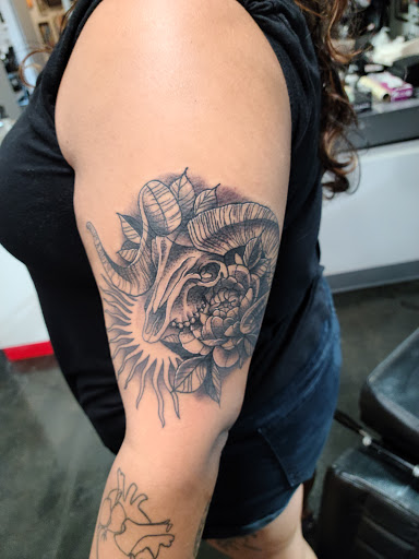 Explore sleeve tattoo ideas female, creative tattoo ideas in Colorado Springs, available at Fallen Heroes Tattoo & Piercing (Colorado)