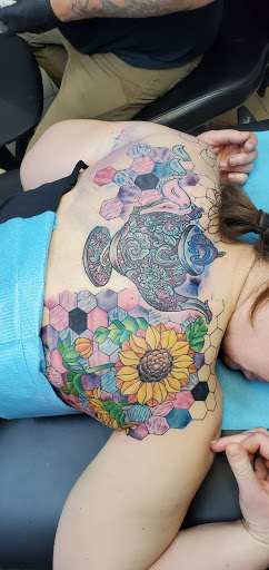 Explore ocean tattoo ideas for ladies, creative tattoo ideas in Lawrence, available at Skin Illustrations Tattoos & Piercings