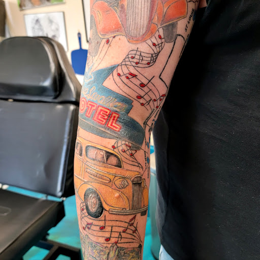 Explore forearm tattoo idea for men, creative tattoo ideas in Traverse City, available at Pinups & Needles