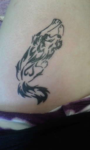 Explore cover up tattoo ideas for upper arm, creative tattoo ideas in Gastonia, available at Chaos Tattoos