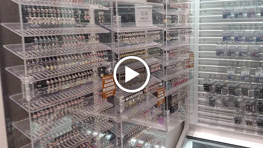 Explore sign language tattoo ideas, creative tattoo ideas in Minneapolis, available at Almost Famous Body Piercing