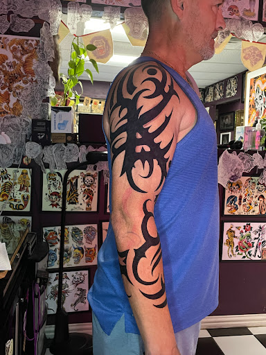 Explore tattoo ideas for football, creative tattoo ideas in Georgetown, available at Iron Rite Tattoo South