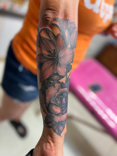 Explore women's leg tattoo ideas, creative tattoo ideas in Loganville, available at Not Of This World Tattoo & Piercing