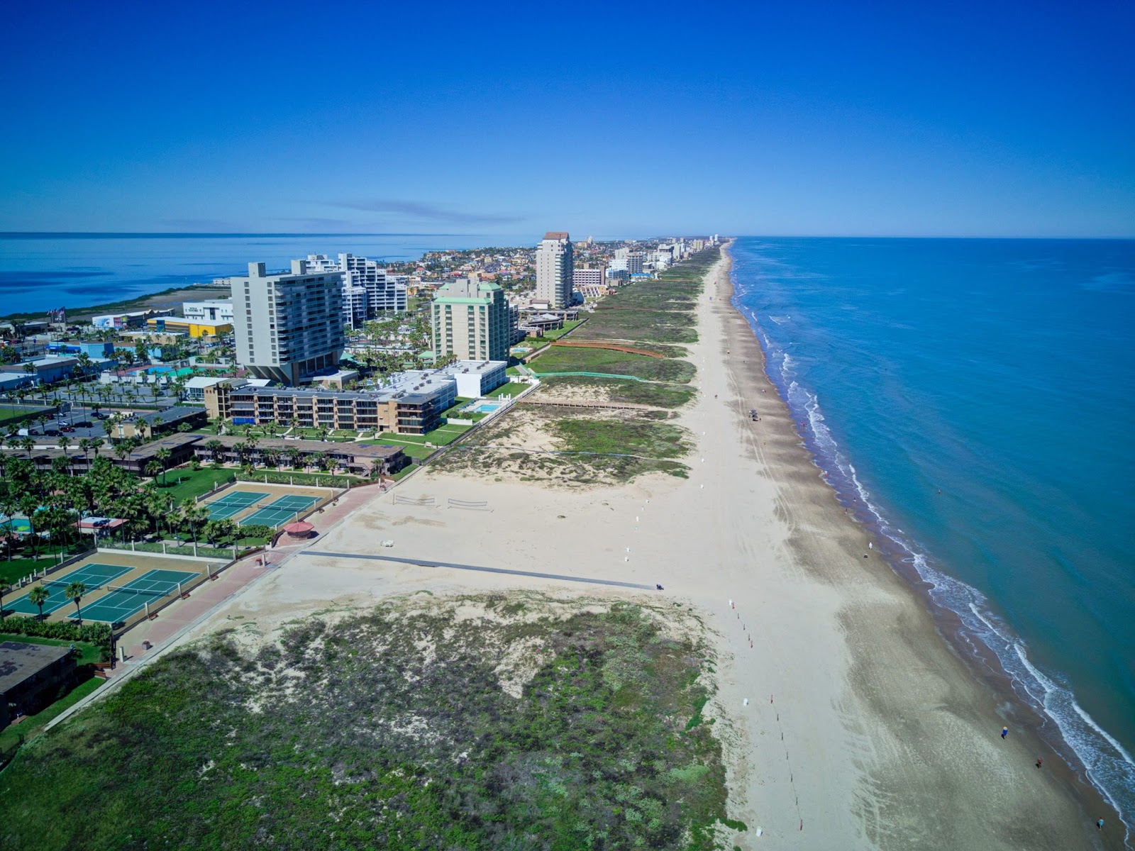 Photo of South Padre Island beach with long straight shore