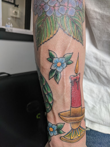 Explore back tattoo ideas for guys, creative tattoo ideas in Danbury, available at Danbury Tattoo & Piercing