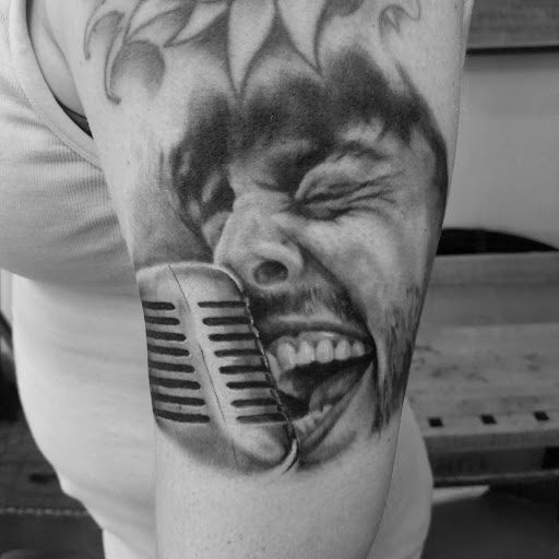 Explore chest tattoo ideas, creative tattoo ideas in Green Bay, available at The Blue Gem Tattooing