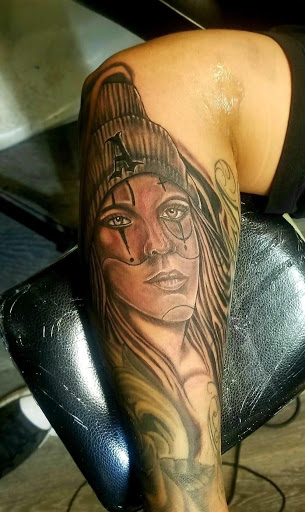 Explore semicolon tattoo ideas for females, creative tattoo ideas in Denver, available at Viva La Raza Tattoo Club