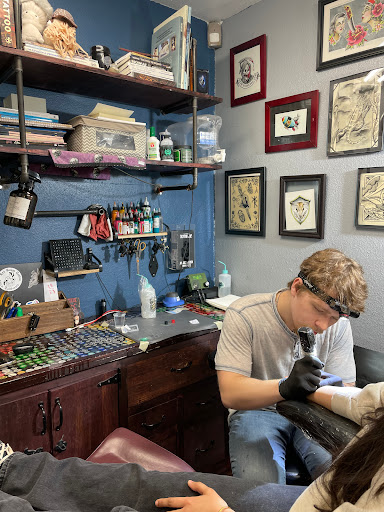 Explore sewing tattoo ideas, creative tattoo ideas in Fresno, available at Red Wave Tattoo & Art Gallery