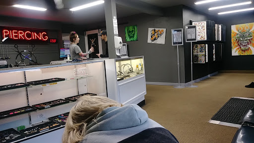 Explore mens travel tattoo ideas, creative tattoo ideas in Portland, available at Paramount Tattoo Studio