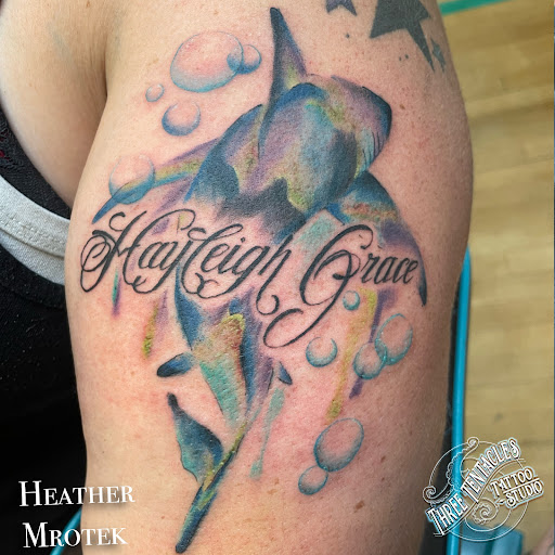 Explore cover up lower back tattoo ideas, creative tattoo ideas in Hayward, available at Three Tentacles Tattoo Studio