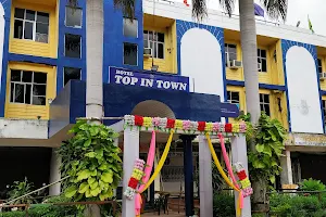 Top In Town image